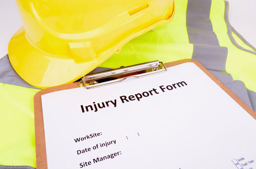 Hard hat, vest and workplace injury report form