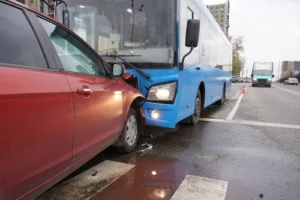 Gastonia bus accident lawyer consulting with injured client about compensation claim