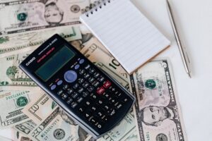 calculator and workers’ compensation settlement money