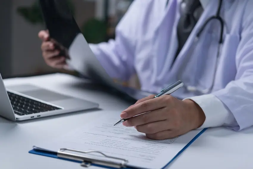 Charlotte workers' compensation lawyer reviewing a client's case