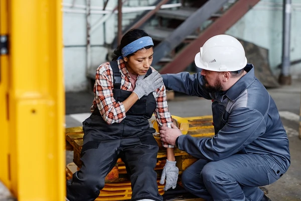 A Charlotte employee reports a workplace injury to a supervisor.