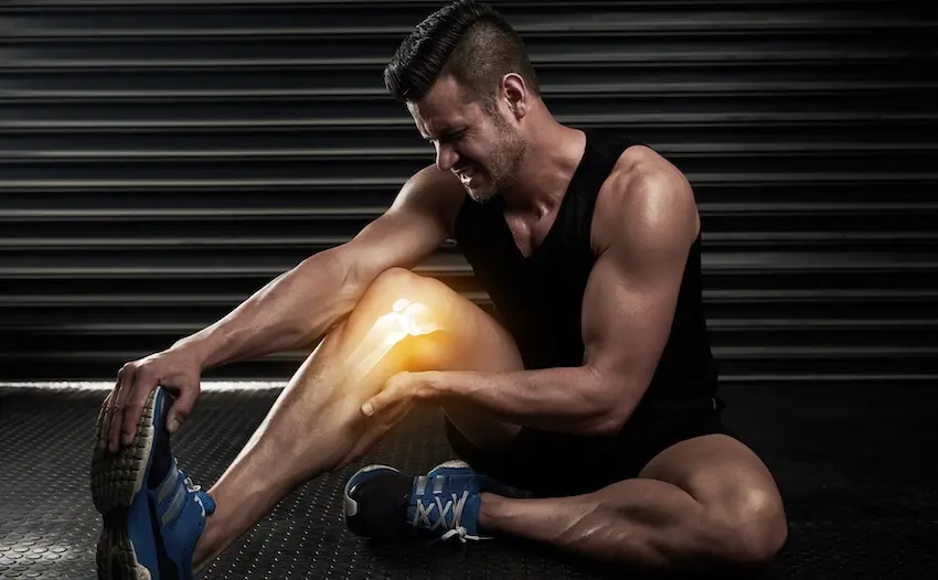 A male athlete with a knee injury needs medical attention that personal injury lawyers can help pursue compensation for in North Carolina.