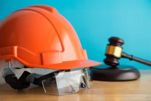 Charlotte construction accident lawyer meeting with construction accident victims reviewing witness statements for a personal injury claim related to traumatic brain injuries and spinal cord injuries sustained on site.